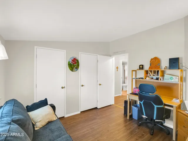 a workspace with furniture and window