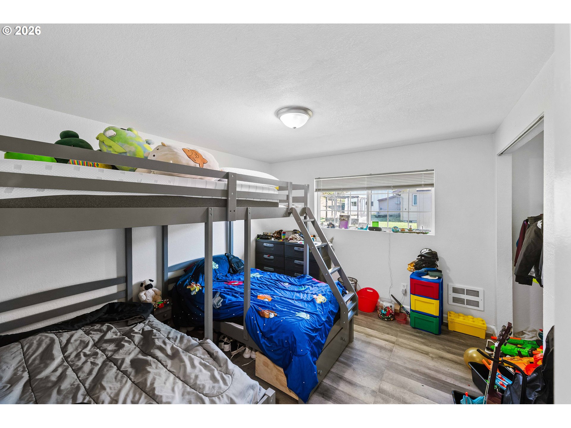 1643 Shelley Road Coquille, OR 97423 - Photo 17 of 39 a living room with furniture and a flat screen tv