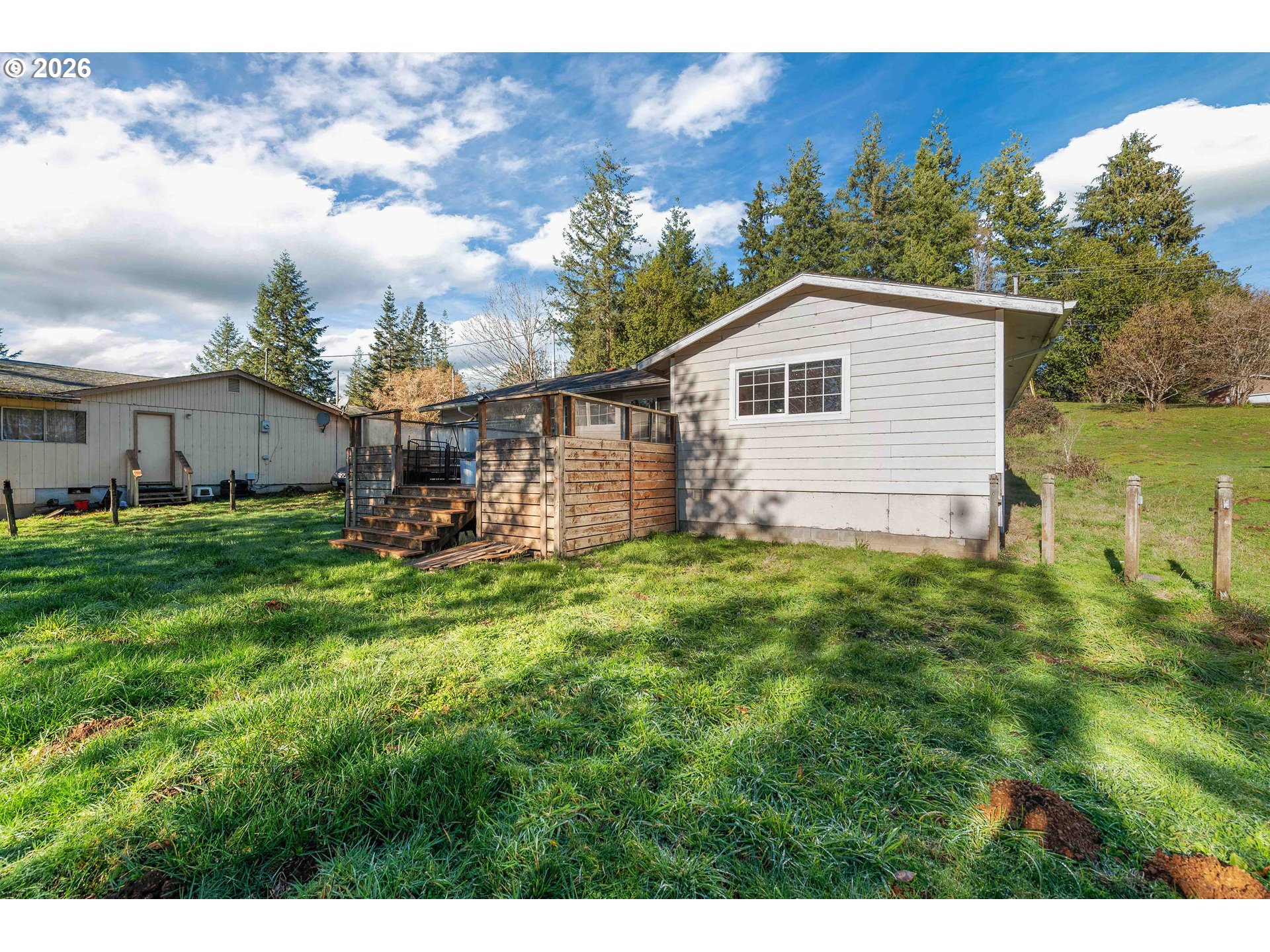 1643 Shelley Road Coquille, OR 97423 - Photo 33 of 39 a view of backyard of house with green space