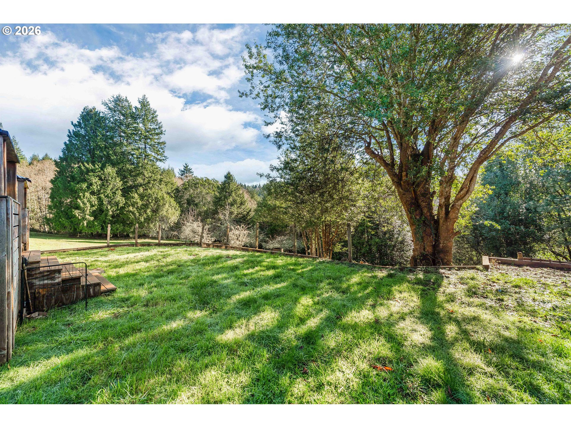 1643 Shelley Road Coquille, OR 97423 - Photo 35 of 39 a view of a yard with a tree