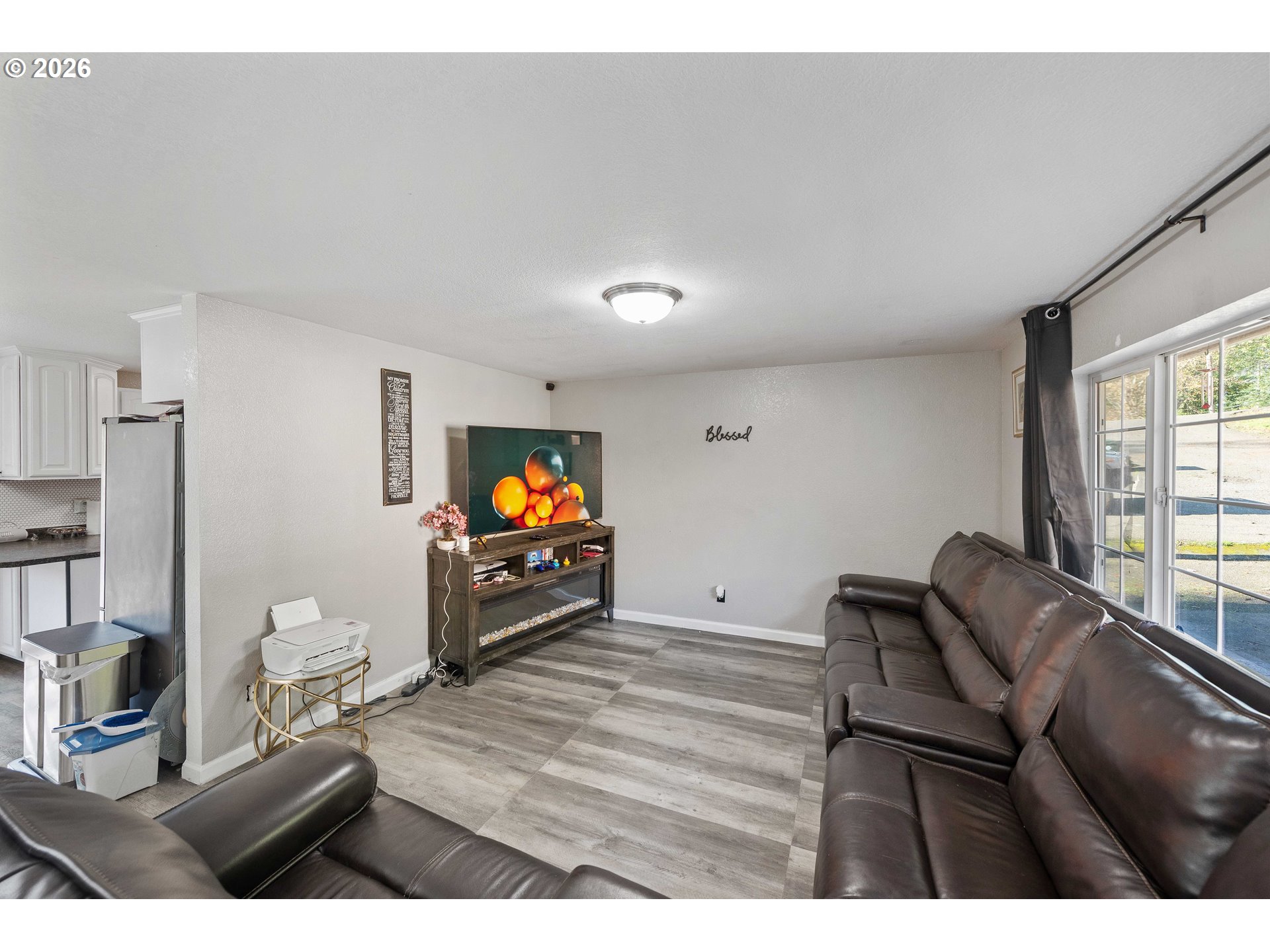 1643 Shelley Road Coquille, OR 97423 - Photo 6 of 39 a living room with furniture and a flat screen tv