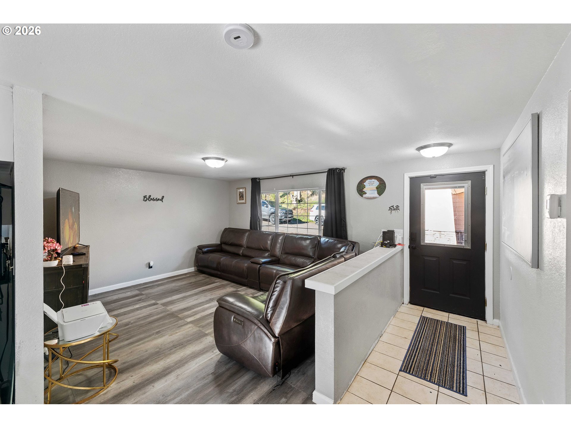 1643 Shelley Road Coquille, OR 97423 - Photo 8 of 39 a living room with furniture and a flat screen tv