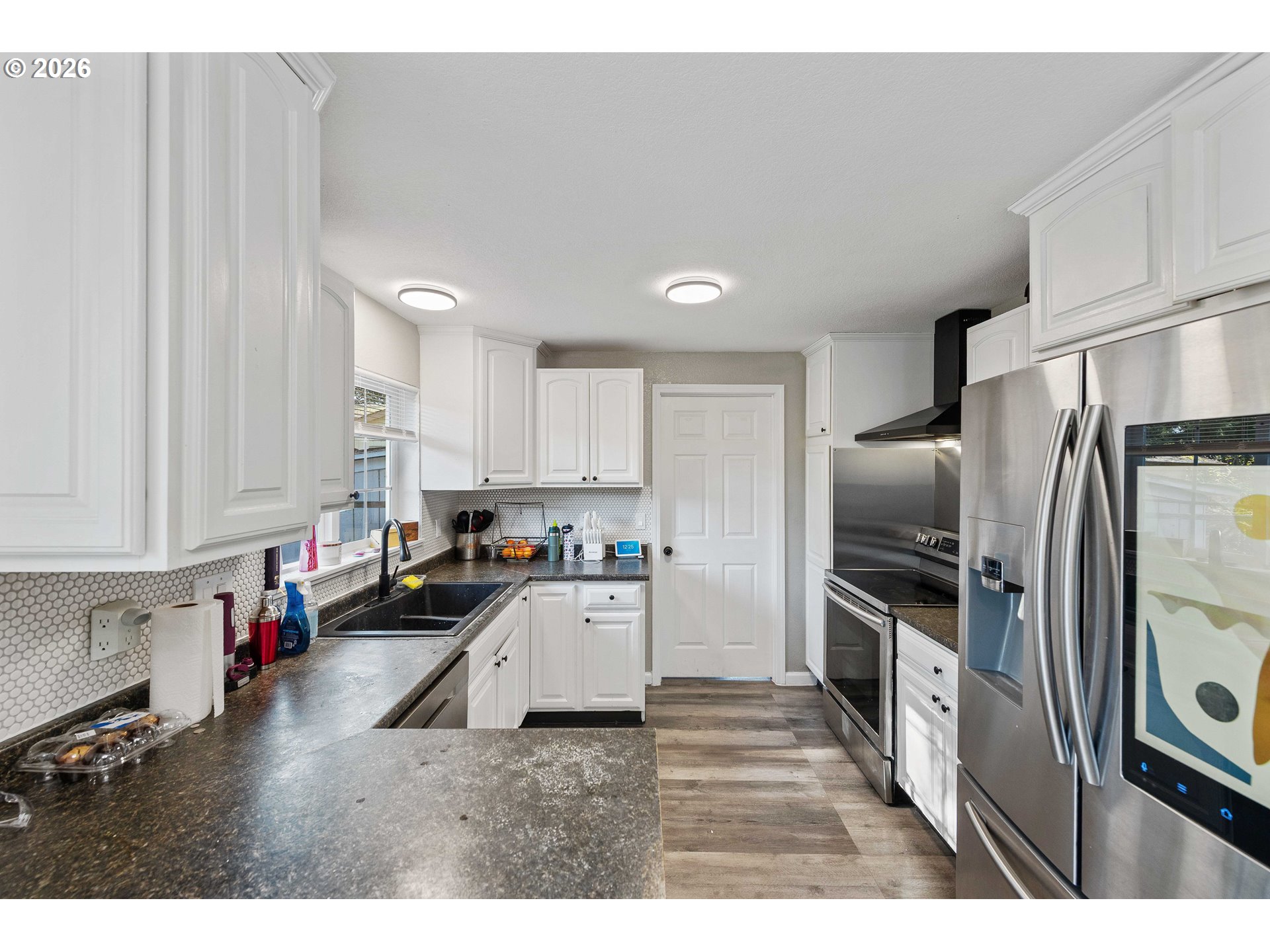 1643 Shelley Road Coquille, OR 97423 - Photo 10 of 39 a kitchen with refrigerator and cabinets
