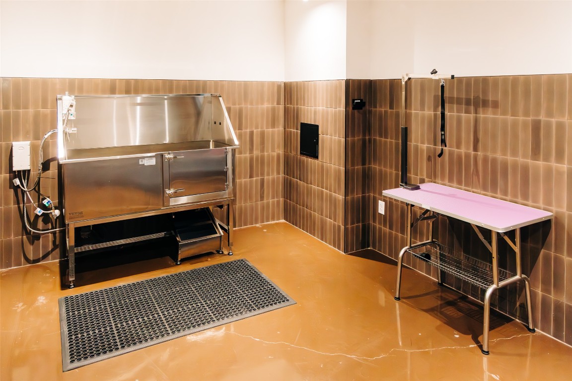 4315 South Congress Avenue, Unit 308 Austin, TX 78745 - Photo 17 of 20 a balcony with a table and chairs