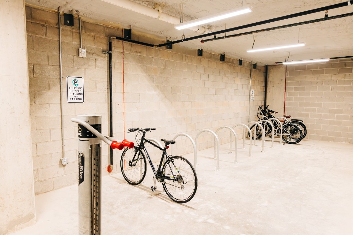 4315 South Congress Avenue, Unit 308 Austin, TX 78745 - Photo 19 of 20 a bathroom with a granite countertop shower and a sink