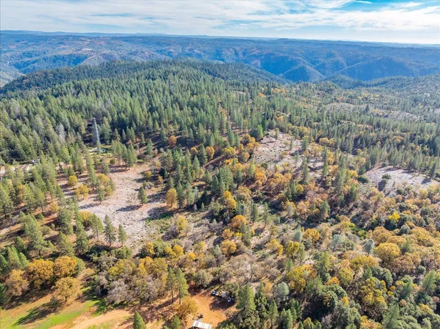 a view of a field with an outdoor space