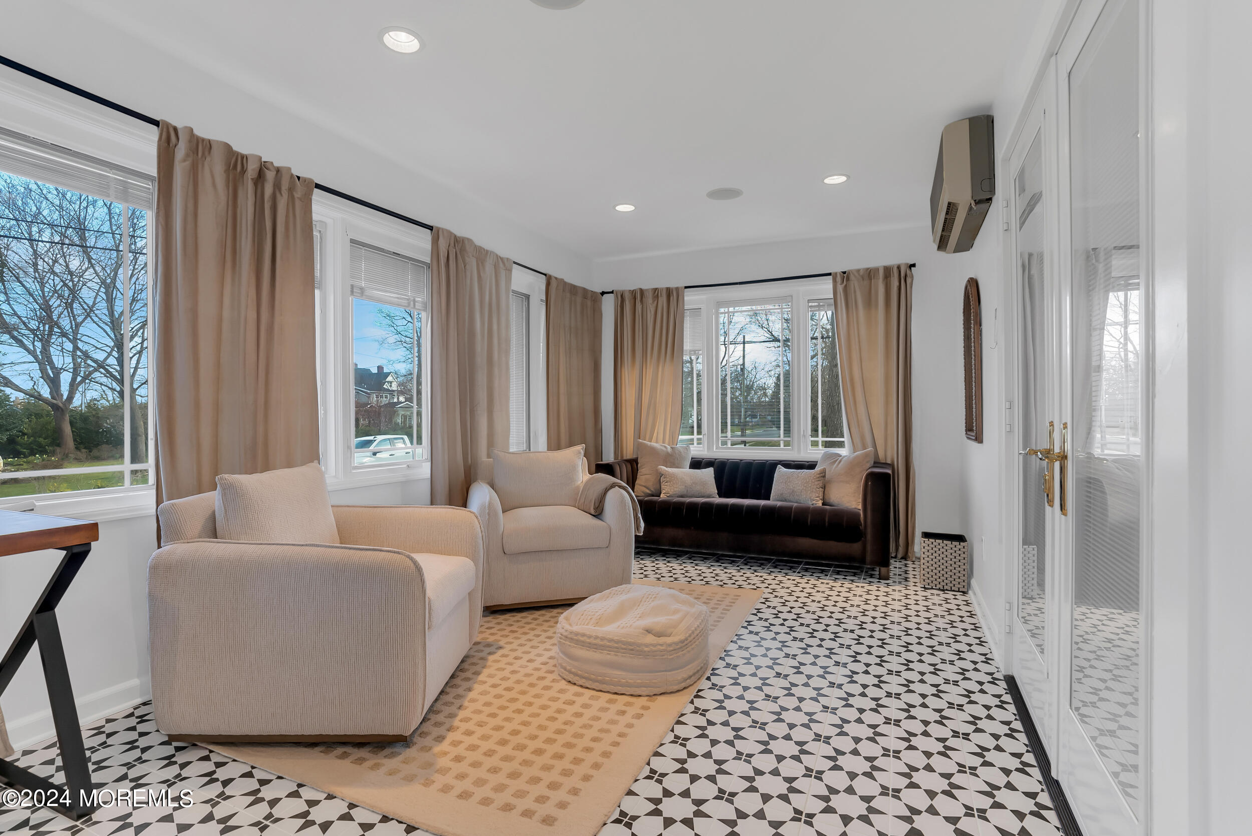 201 Buttermere Avenue Interlaken, NJ 07712 - Photo 13 of 39 a living room with furniture and a large window