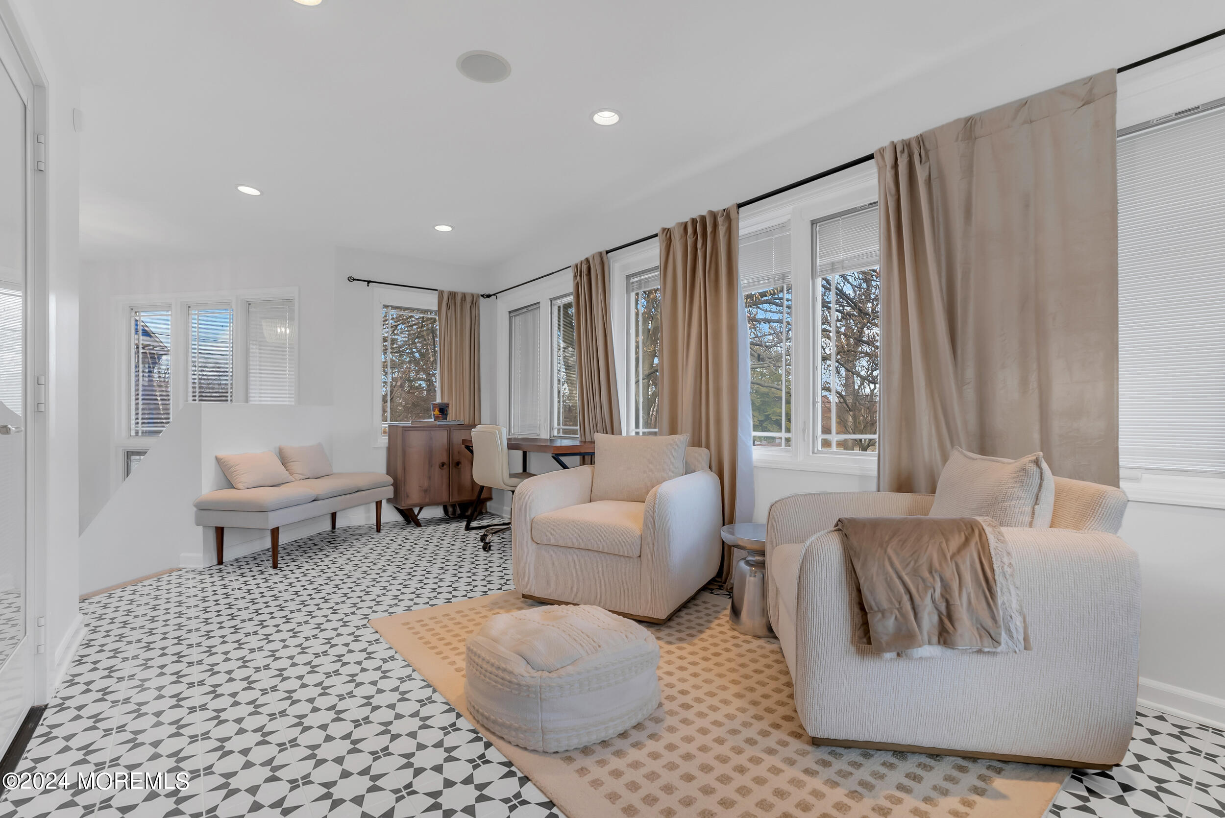 201 Buttermere Avenue Interlaken, NJ 07712 - Photo 14 of 39 a living room with furniture and a large window