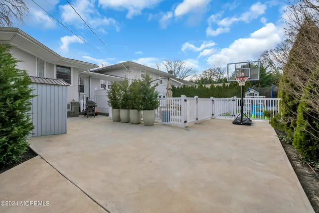 a view of a house with a big yard