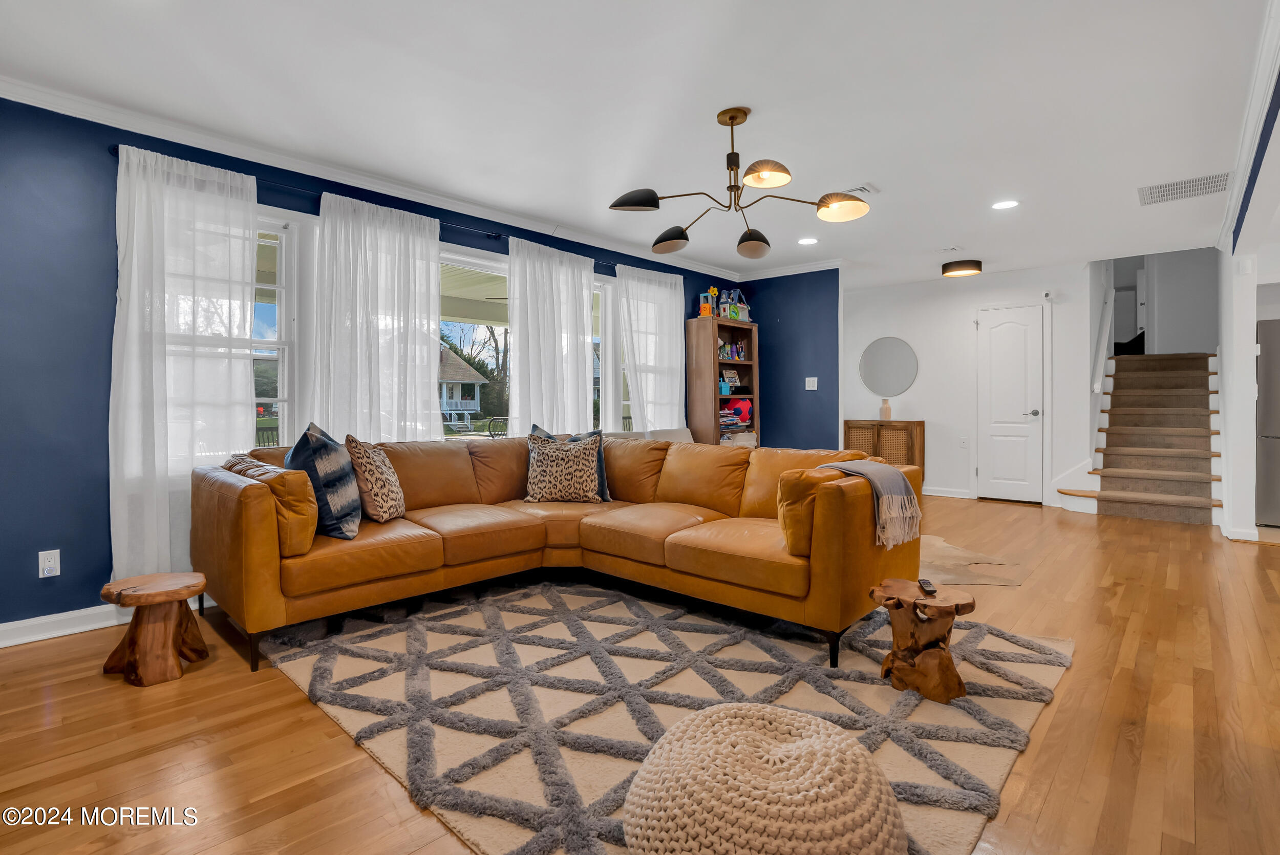 201 Buttermere Avenue Interlaken, NJ 07712 - Photo 6 of 39 a living room with furniture and a large window