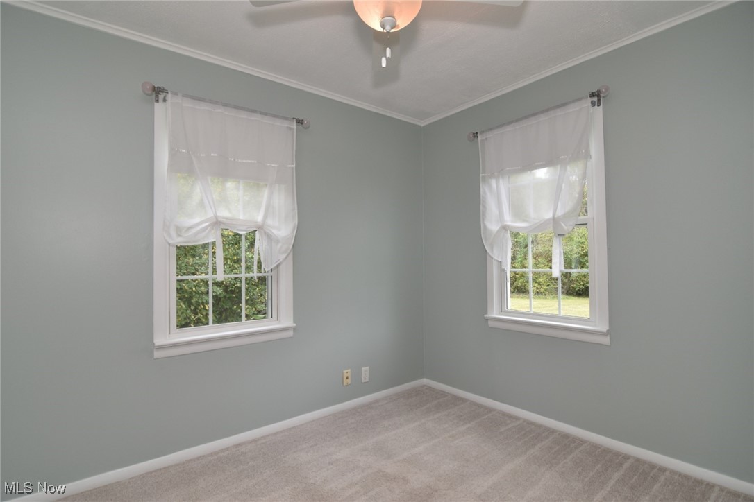 7586 Cedar Road Chesterland, OH 44026 - Photo 17 of 26 Second bedroom with ceiling fan
