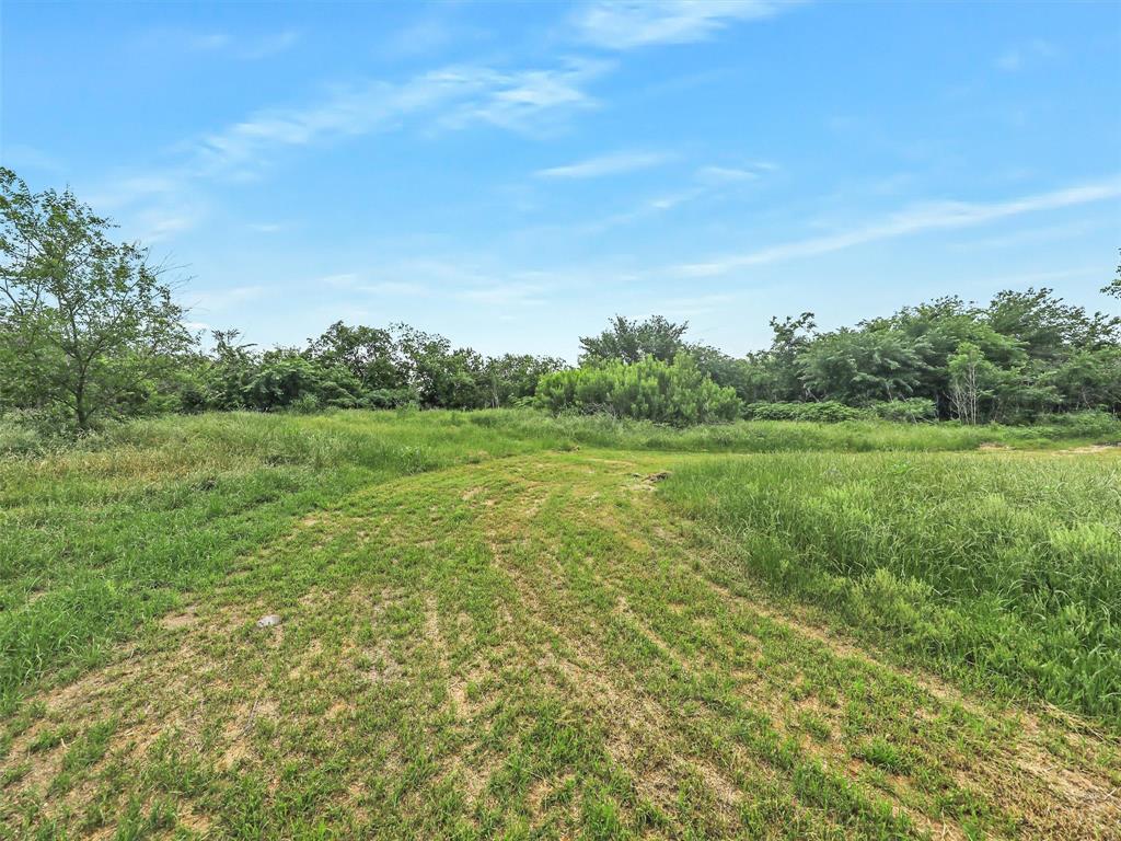 2499 Union Church Road Southlake, TX 76092 - Photo 1 of 40 a view of a grassy field with trees