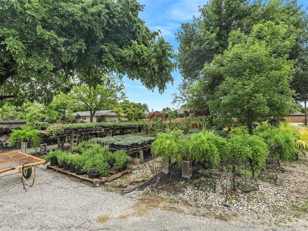 2499 Union Church Road Southlake, TX 76092 - Photo 22 of 40 a backyard of a house with a yard and outdoor seating