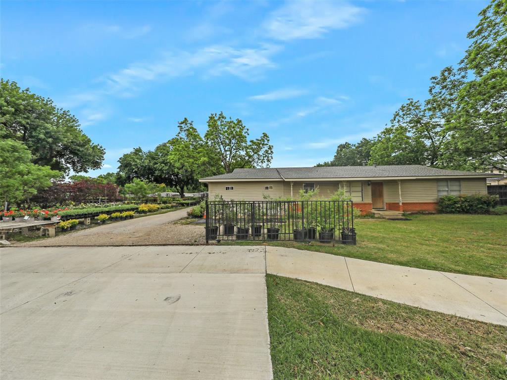 2499 Union Church Road Southlake, TX 76092 - Photo 3 of 40 a view of a house with a yard and a large tree