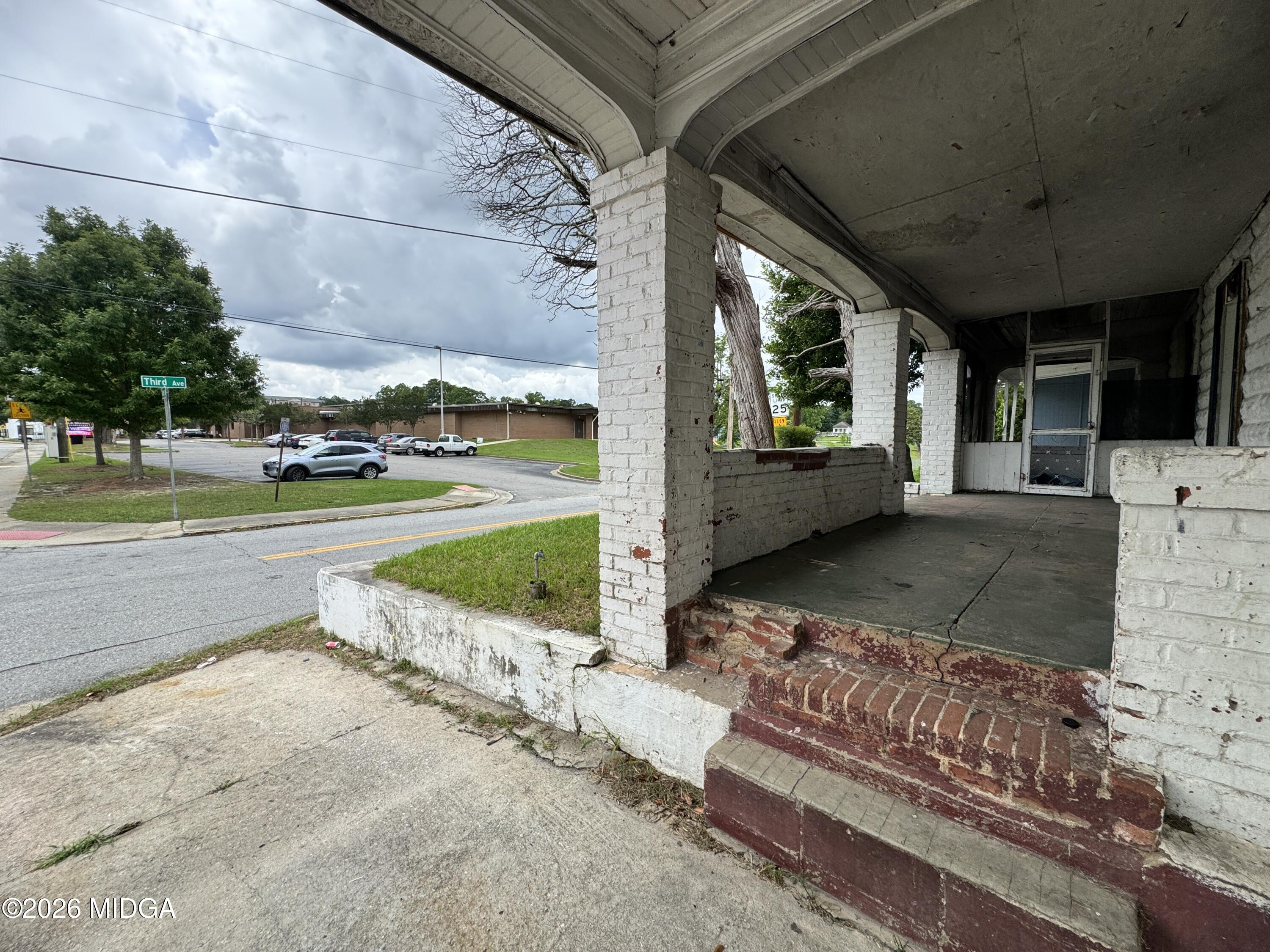1905 3rd Avenue Macon, GA 31201 - Photo 23 of 27 a view of a porch with furniture and a yard