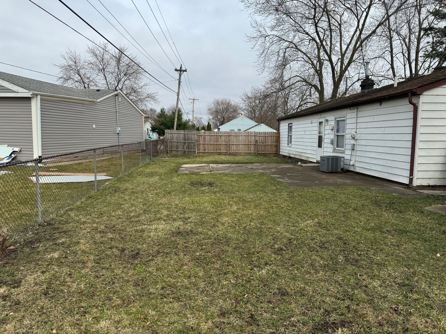 420 Arlington Drive Romeoville, IL 60446 - Photo 19 of 19 a view of a house with a yard
