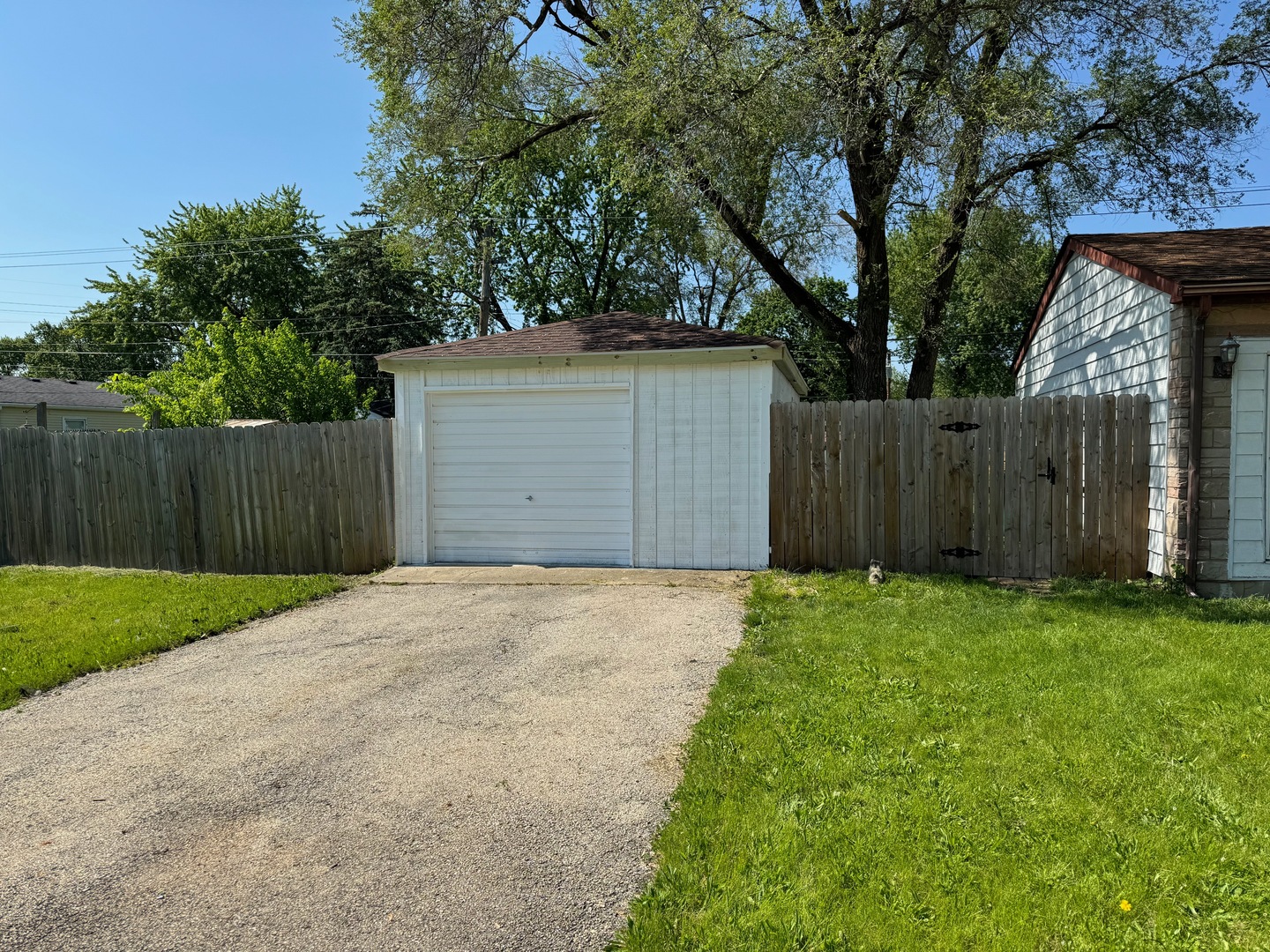 420 Arlington Drive Romeoville, IL 60446 - Photo 2 of 19 a front view of house with yard and trees