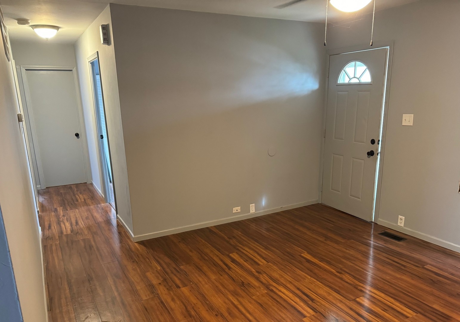 420 Arlington Drive Romeoville, IL 60446 - Photo 4 of 19 a view of empty room with wooden floor