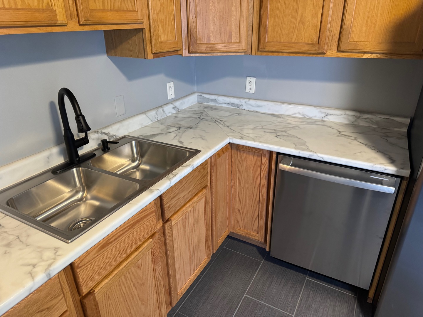 420 Arlington Drive Romeoville, IL 60446 - Photo 6 of 19 a kitchen with a sink and a refrigerator
