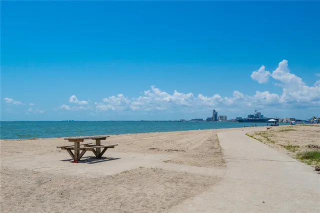 a view of a gym with wooden floor