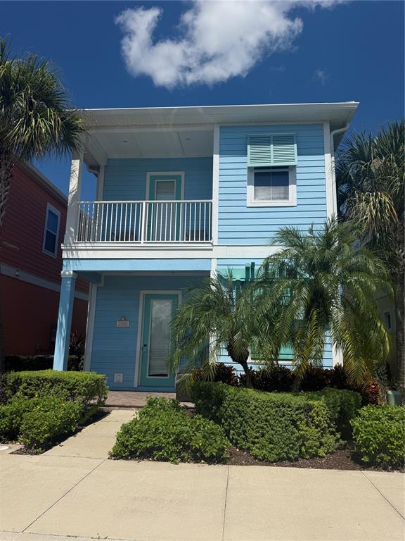 2986 Salted Rim Road Kissimmee, FL 34747 - Photo 1 of 36 a front view of a house with a garden