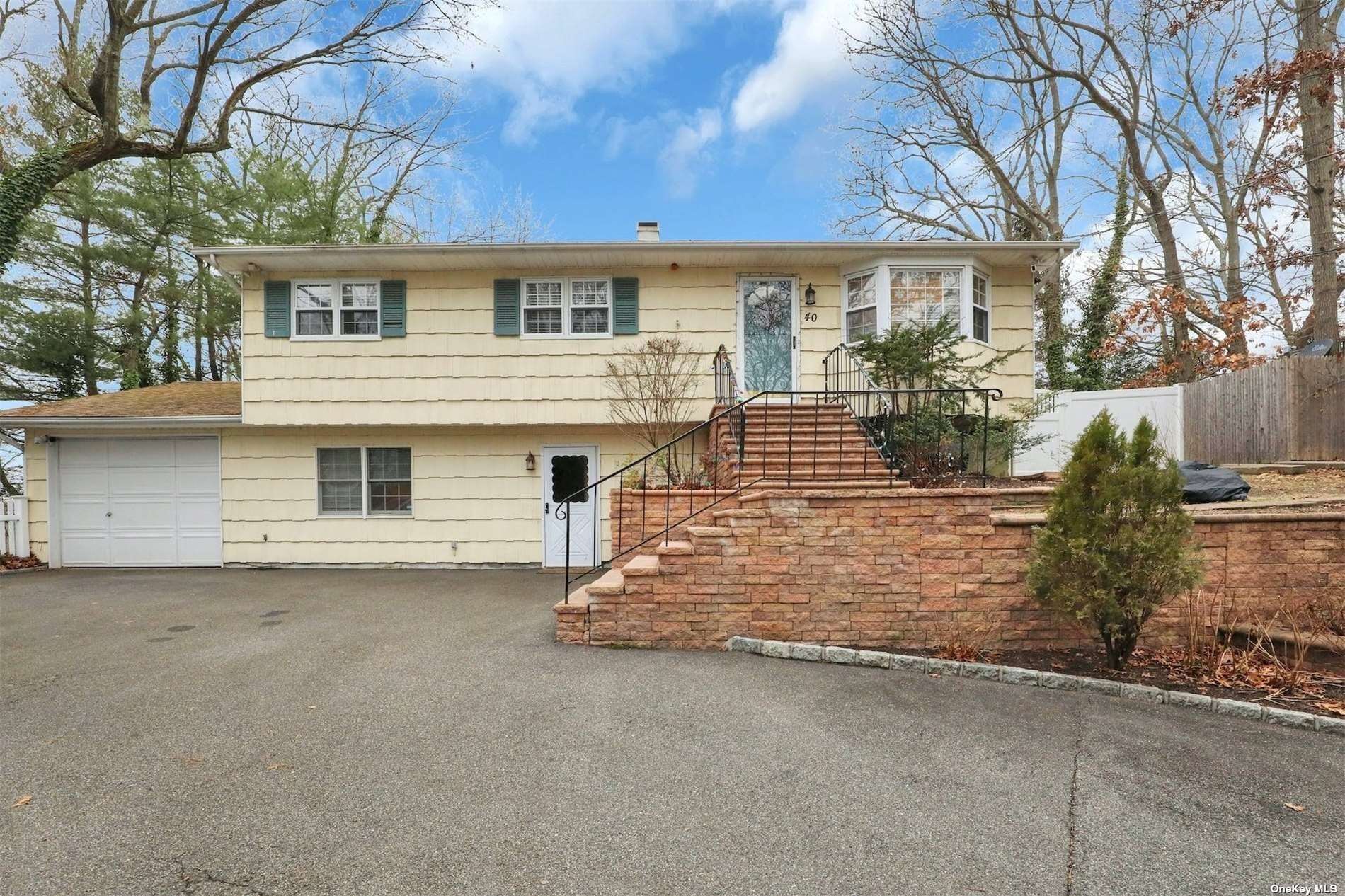 a front view of a house with a garage