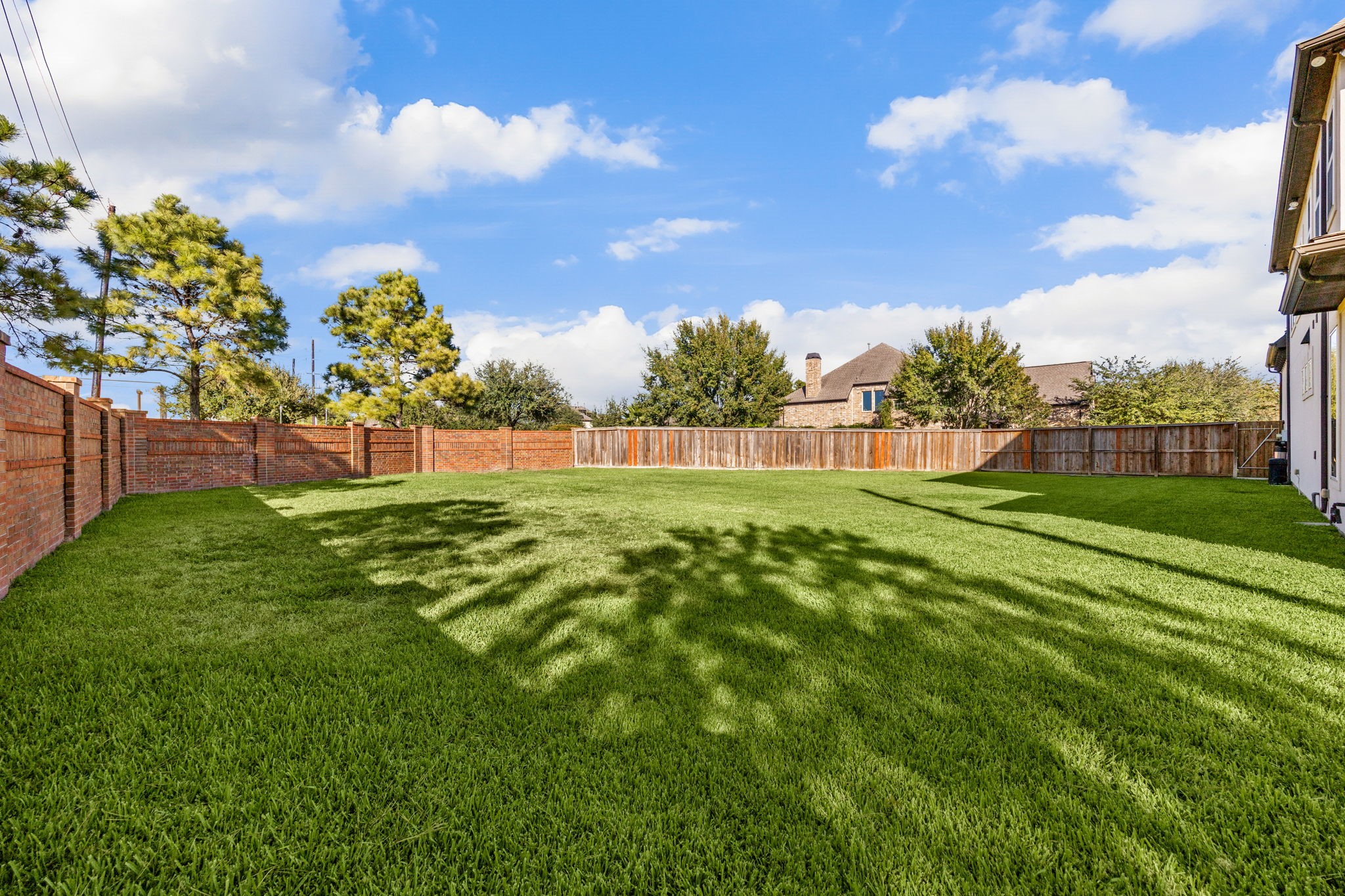 2102 Granite Brook Lane Katy, TX 77494 - Photo 36 of 39 Come and see this spacious backyard with endless possibilities! The large open area offers plenty of room for a future pool, outdoor kitchen, or play space. Perfect for entertaining, relaxing, and enjoying the outdoors in complete privacy!
