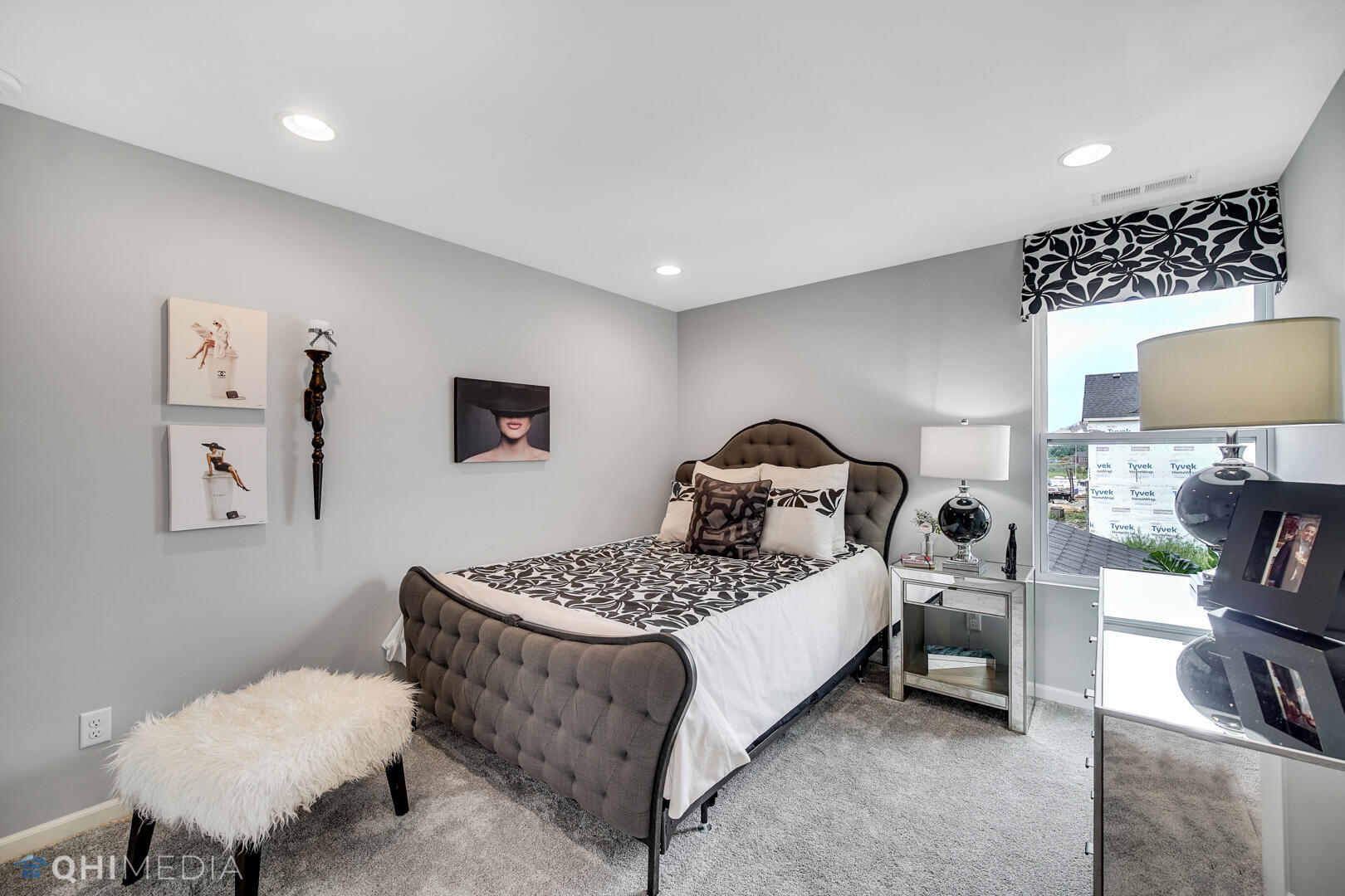 25 Levanno Drive Crown Point, IN 46307 - Photo 18 of 25 a bedroom with a bed and a lamp on table