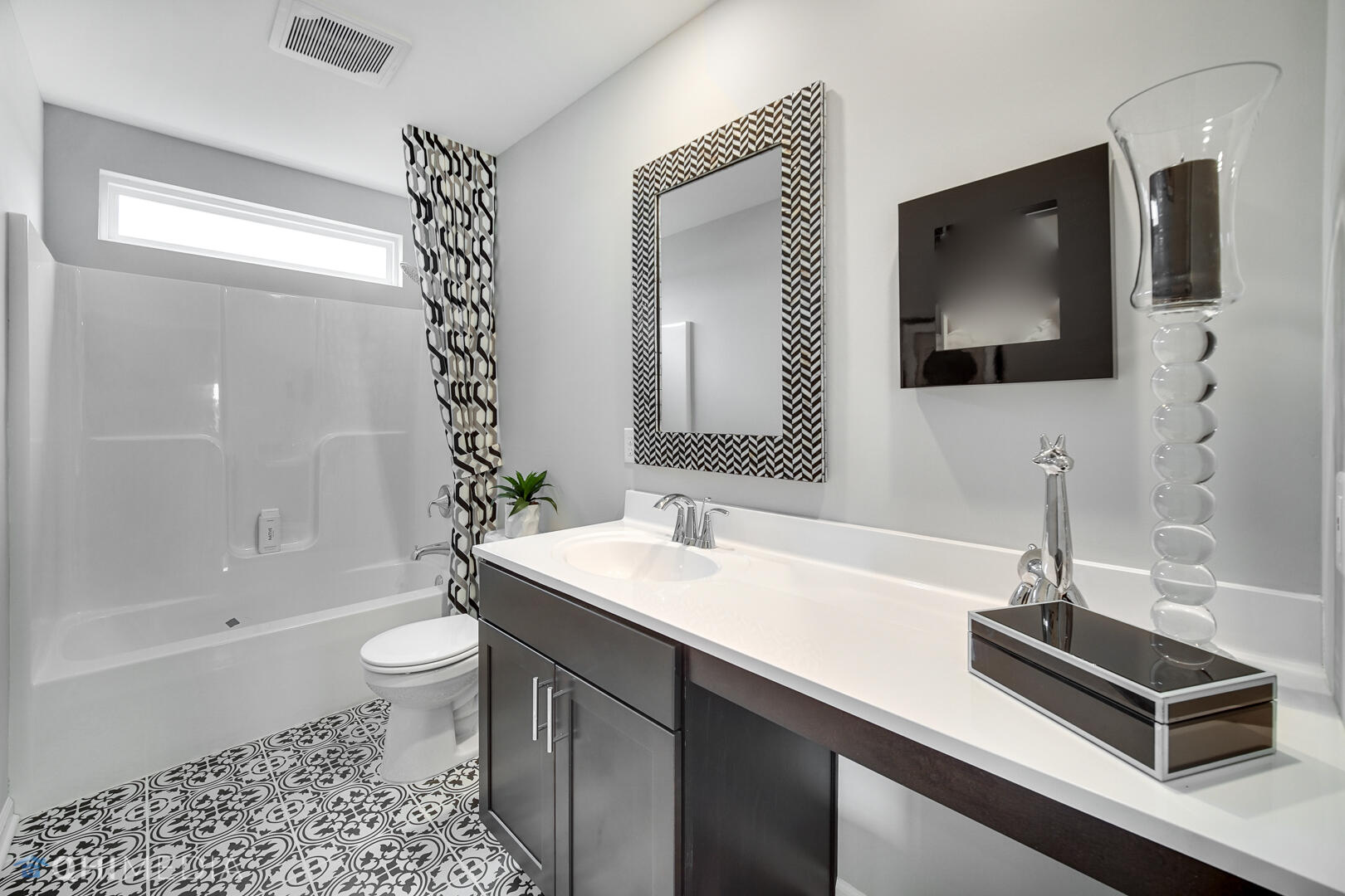25 Levanno Drive Crown Point, IN 46307 - Photo 21 of 25 a bathroom with a sink a toilet a mirror and shower