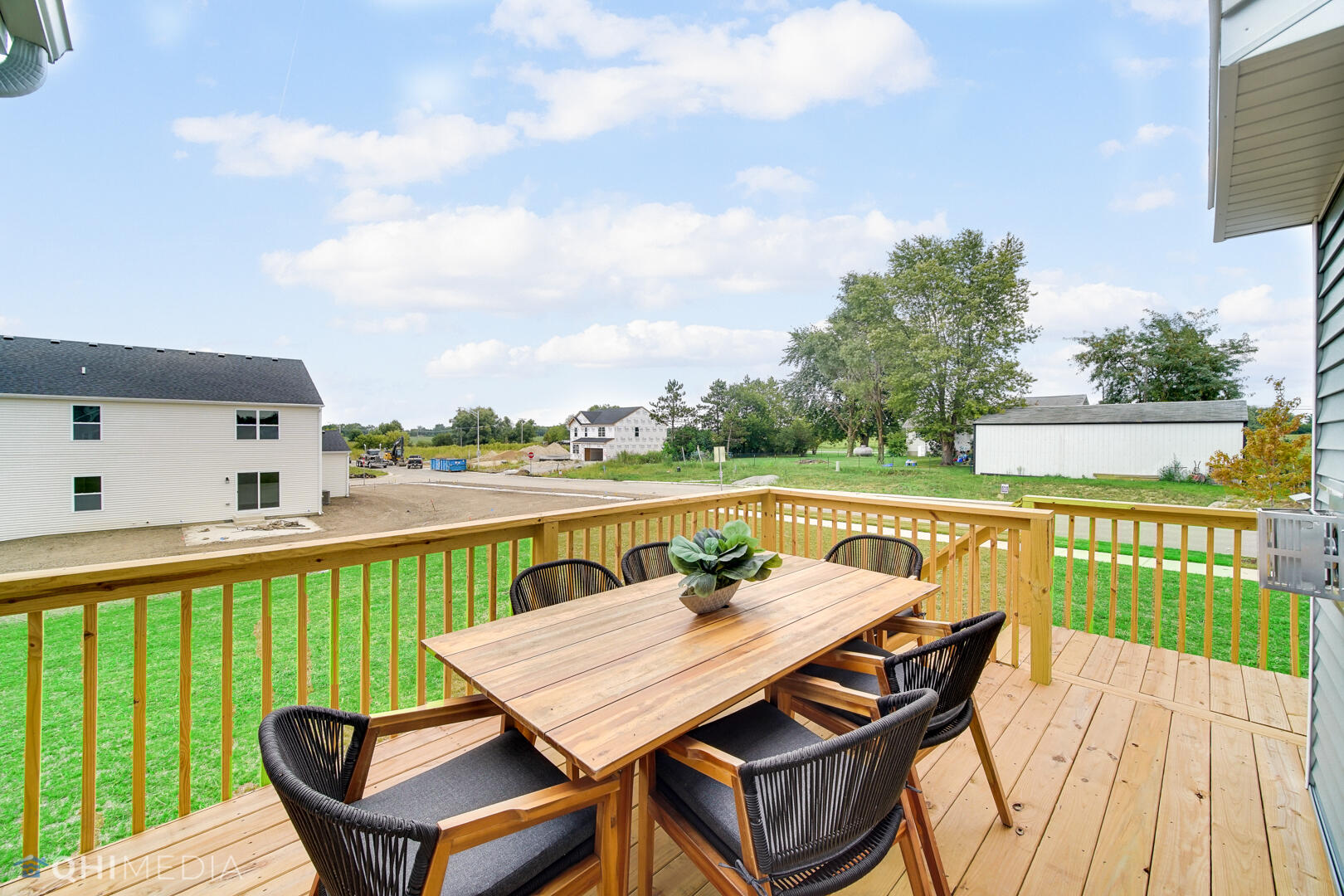 25 Levanno Drive Crown Point, IN 46307 - Photo 24 of 25 a view of a balcony with wooden floor and outdoor seating
