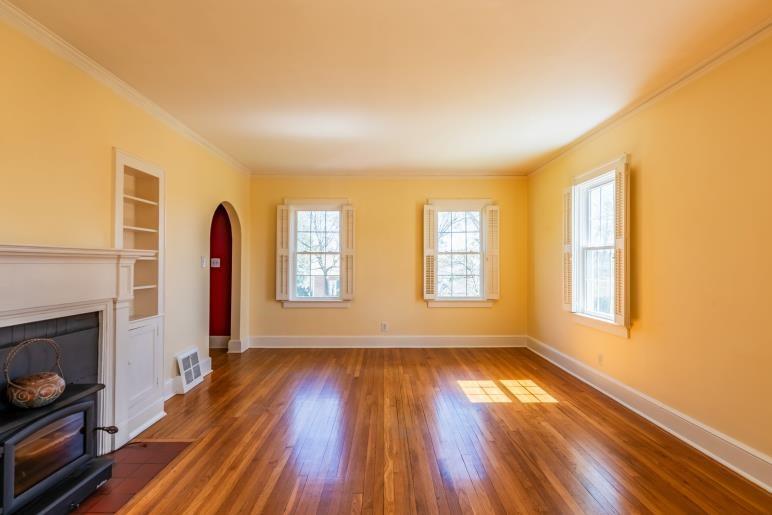 4 Jones Street Cartersville, GA 30120 - Photo 12 of 36 a view of an empty room with glass door and wooden floor