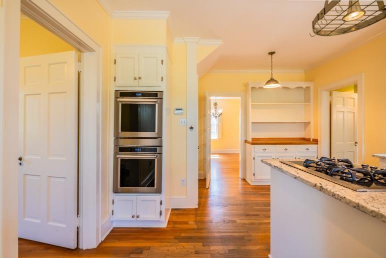 4 Jones Street Cartersville, GA 30120 - Photo 16 of 36 a kitchen with stainless steel appliances a stove and a refrigerator