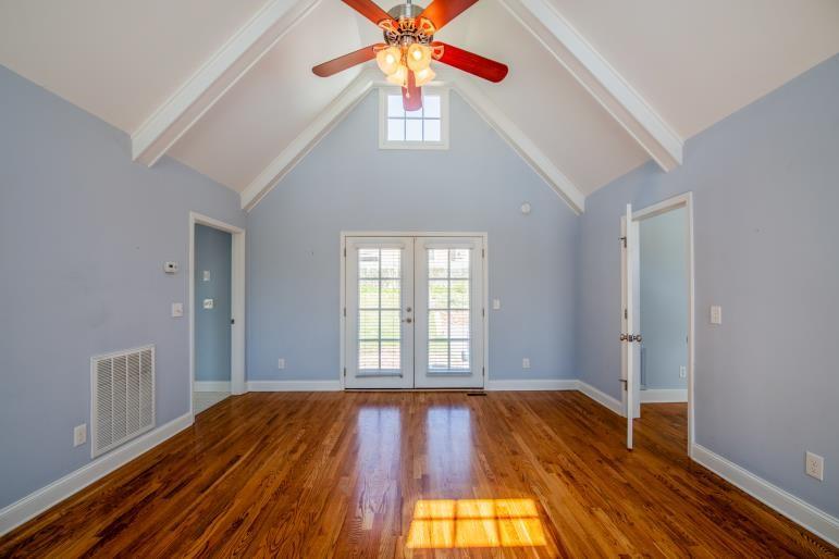 4 Jones Street Cartersville, GA 30120 - Photo 27 of 36 wooden floor in an empty room with a window