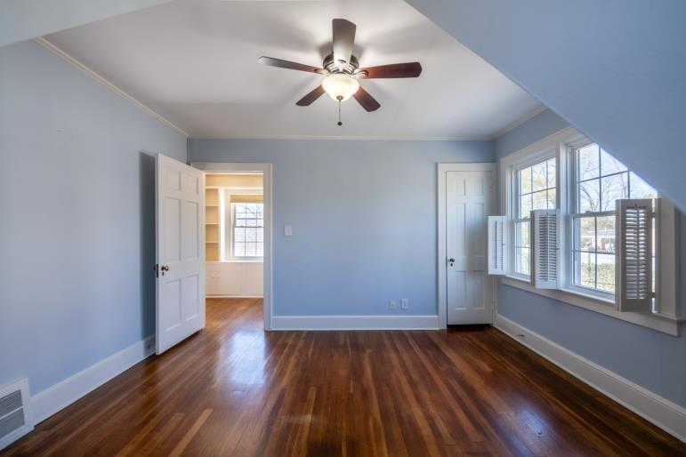 4 Jones Street Cartersville, GA 30120 - Photo 33 of 36 wooden floor in an empty room with a window