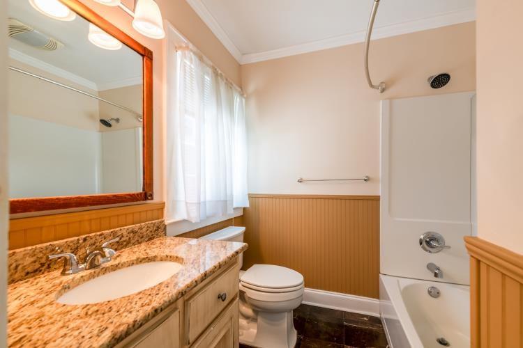 4 Jones Street Cartersville, GA 30120 - Photo 35 of 36 a bathroom with a sink a toilet and shower