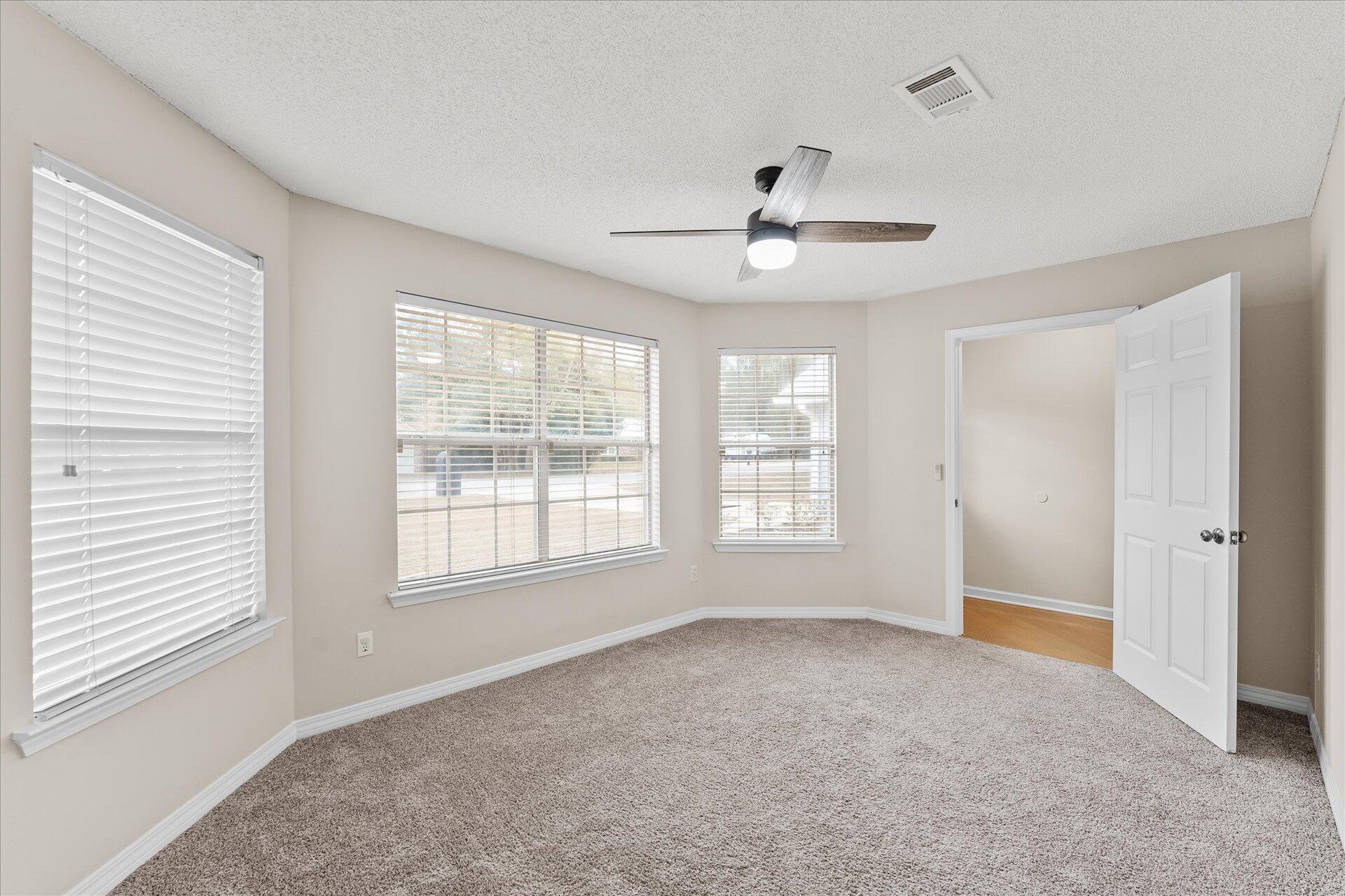 2723 Rambler Court Navarre, FL 32566 - Photo 19 of 40 a view of an empty room with a window