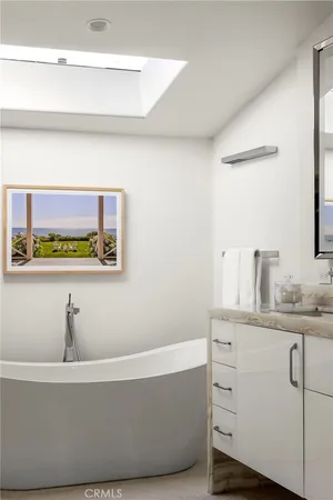 a bathroom with a bathtub and sink