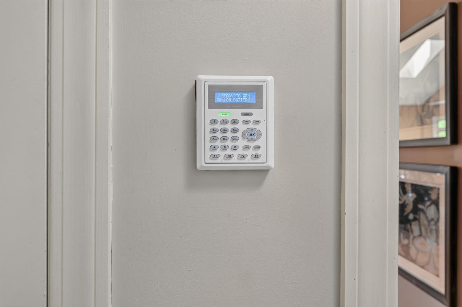 20980 State Line Road Lawrenceburg, IN 47025 - Photo 51 of 99 Smart Security System keypad near the garage entry
