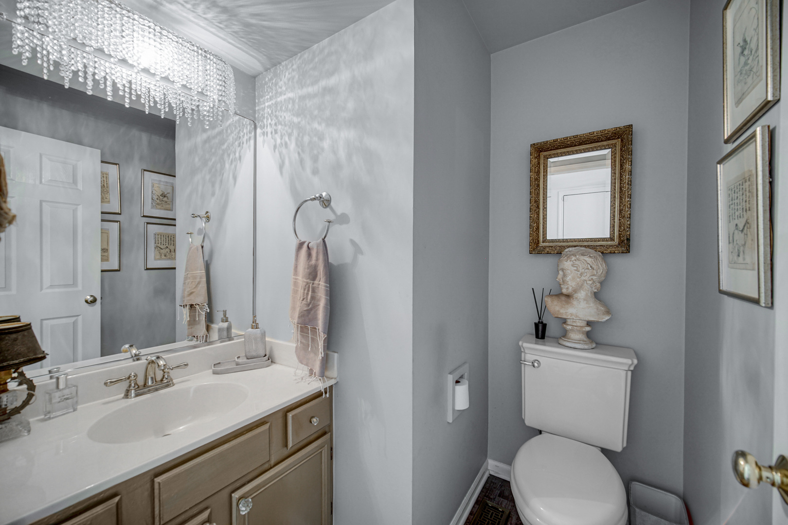 9209 Jasmine Way Fox River Grove, IL 60021 - Photo 14 of 37 a bathroom with a toilet sink and mirror