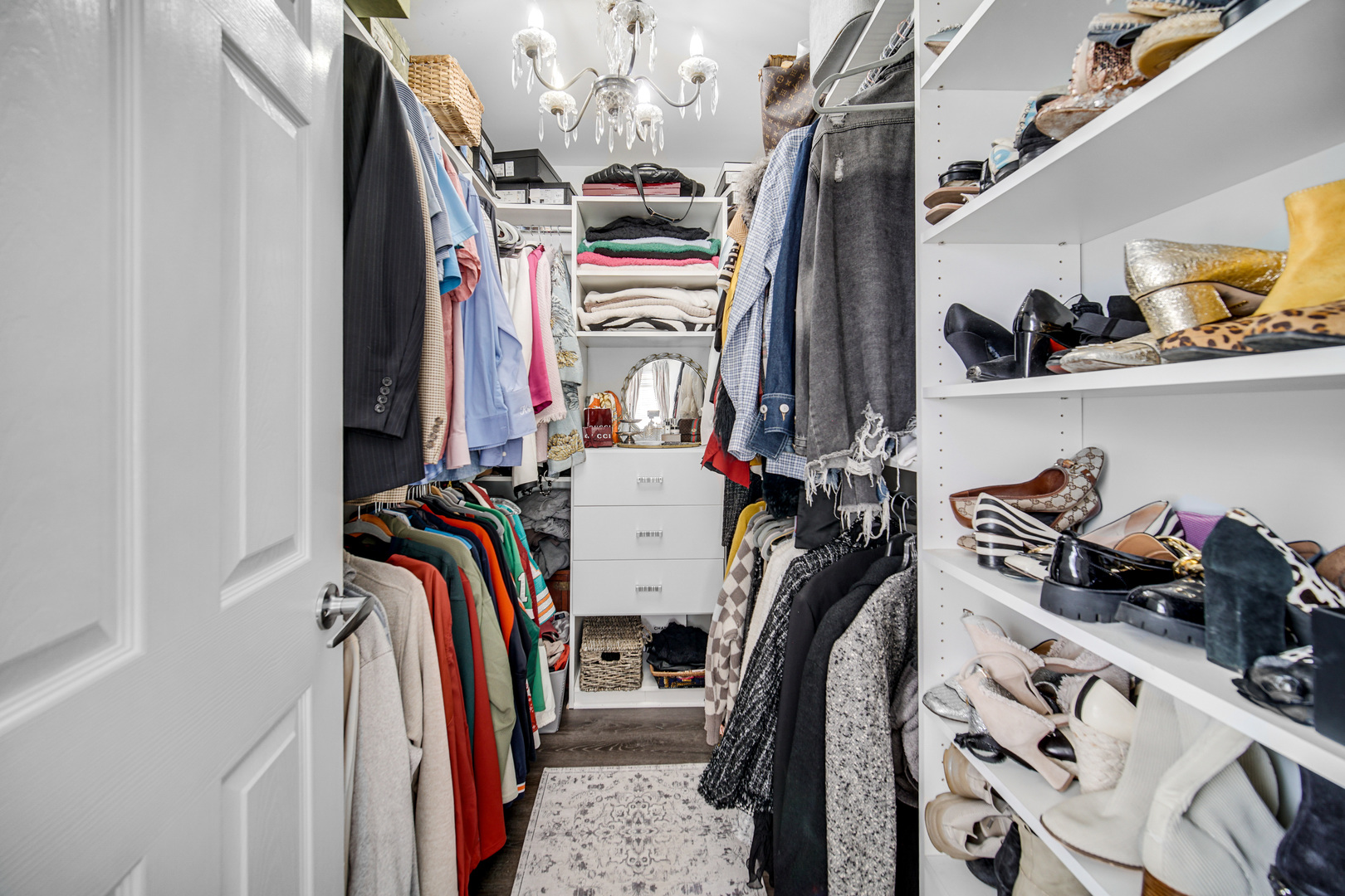 9209 Jasmine Way Fox River Grove, IL 60021 - Photo 20 of 37 a view of walk in closet with clothes and shoes