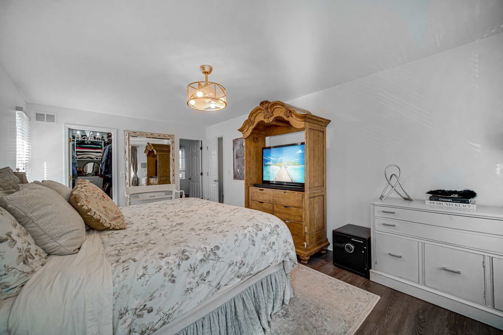 9209 Jasmine Way Fox River Grove, IL 60021 - Photo 22 of 37 a bedroom with a bed and a dresser