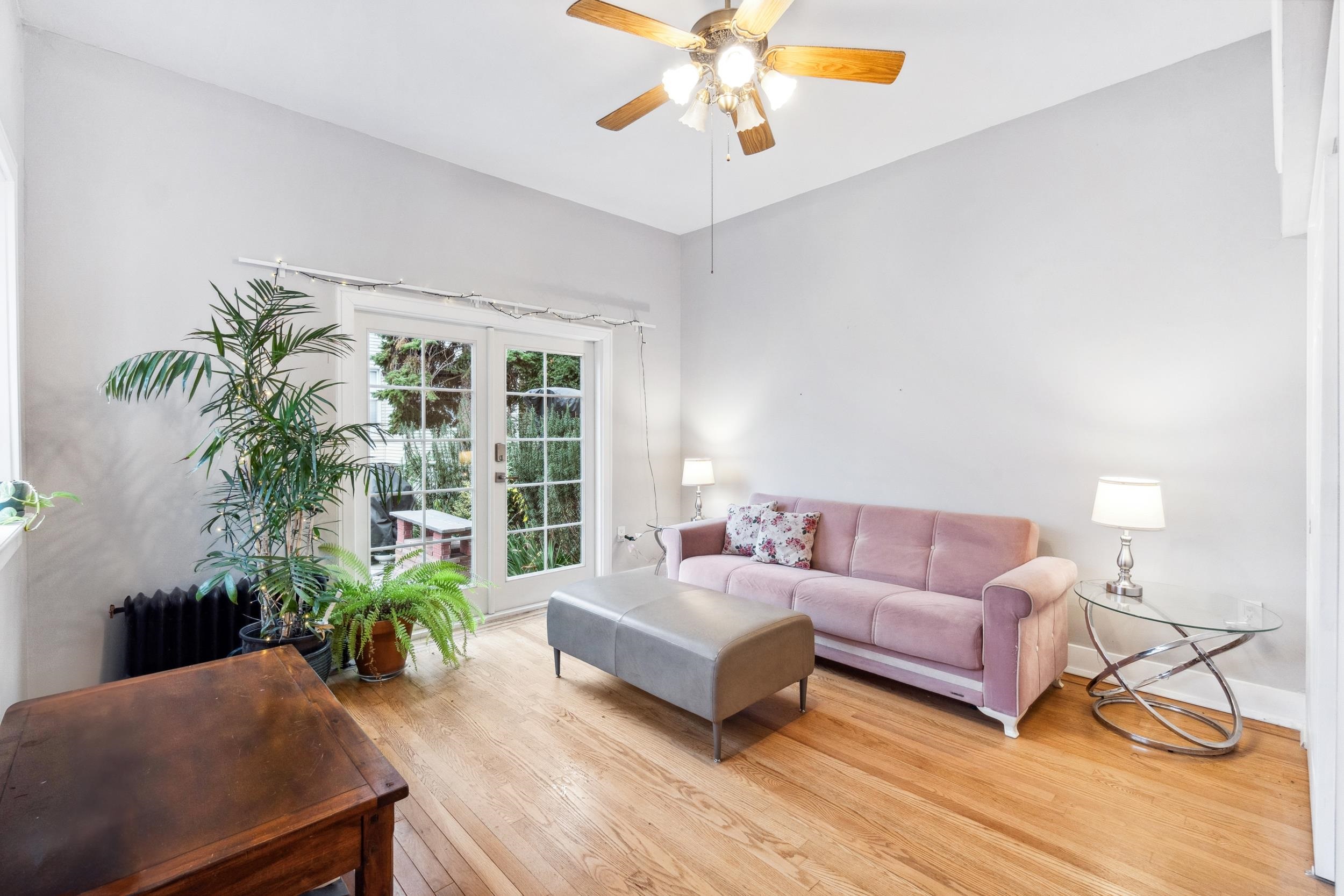 223 Dodd Street, Unit 1 Weehawken, NJ 07086 - Photo 15 of 28 a living room with furniture and a large window