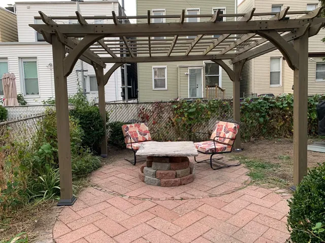 a view of yard with outdoor seating
