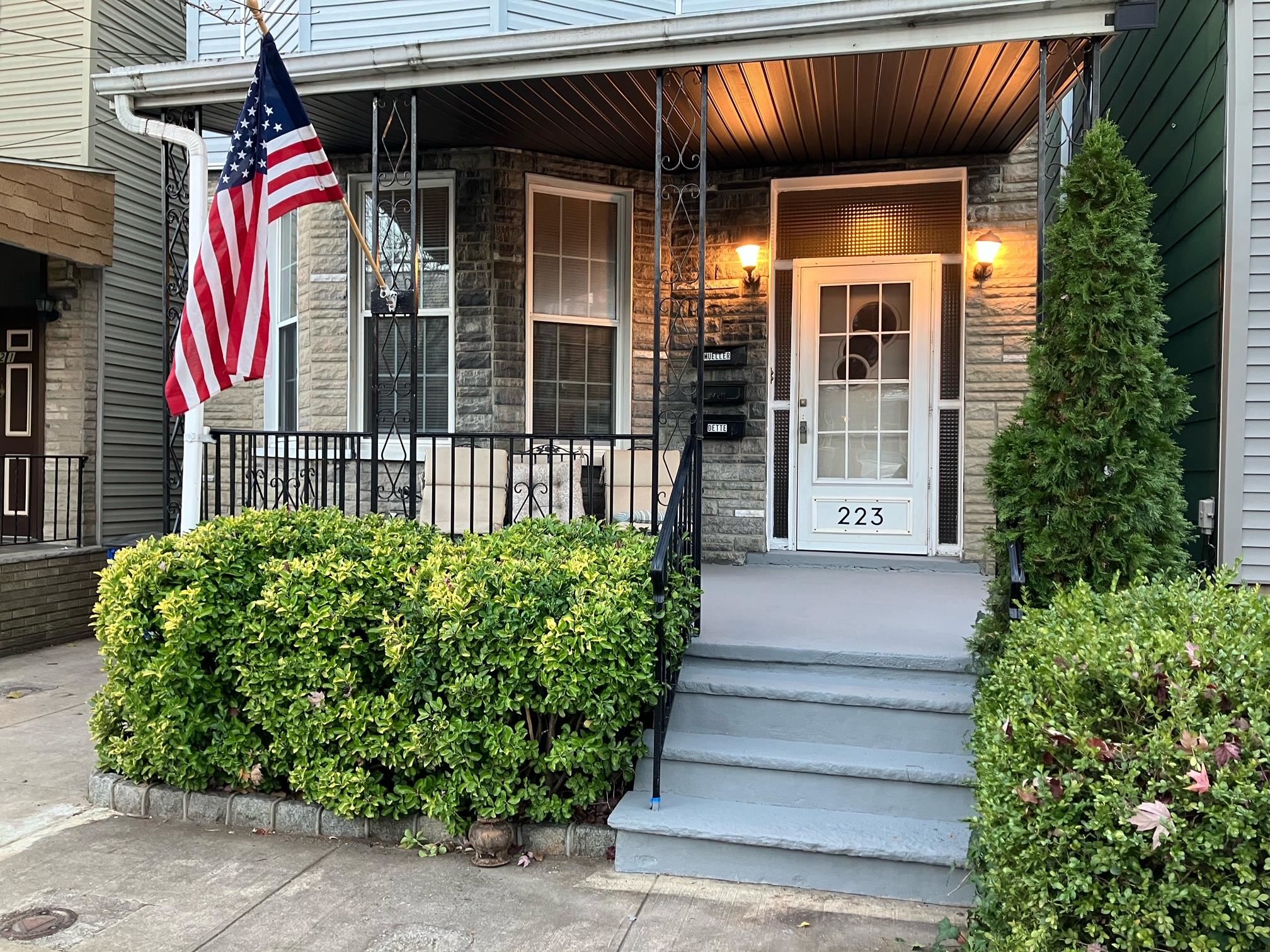 223 Dodd Street, Unit 1 Weehawken, NJ 07086 - Photo 28 of 28 a front view of a house with garden
