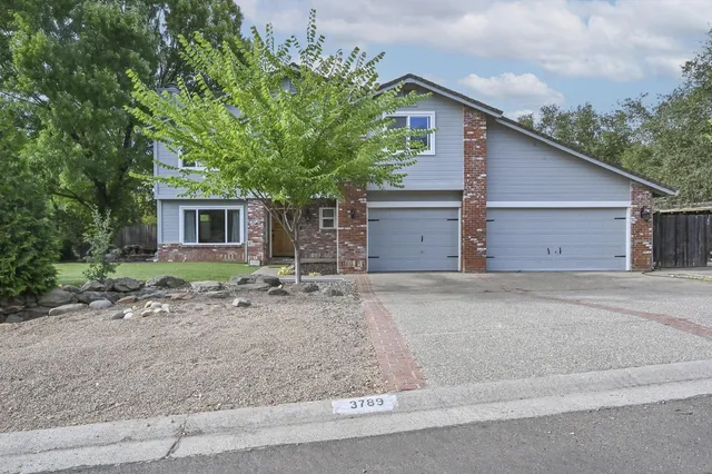 a small white house with a outdoor space