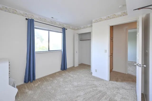 a bathroom with a sink toilet a mirror and shower