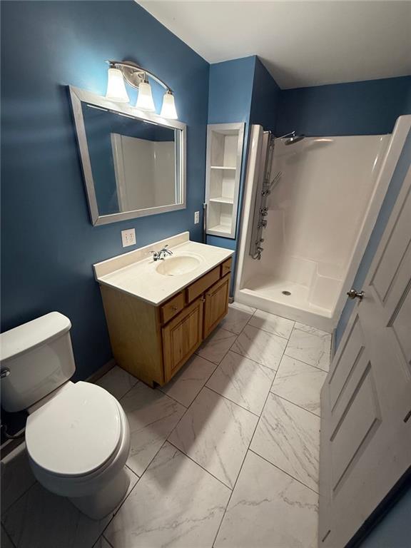 400 Bryant Road Summerville, GA 30747 - Photo 3 of 12 a bathroom with a toilet sink and mirror