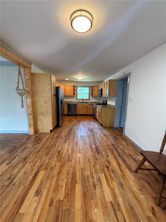 400 Bryant Road Summerville, GA 30747 - Photo 5 of 12 a view of empty room with wooden floor