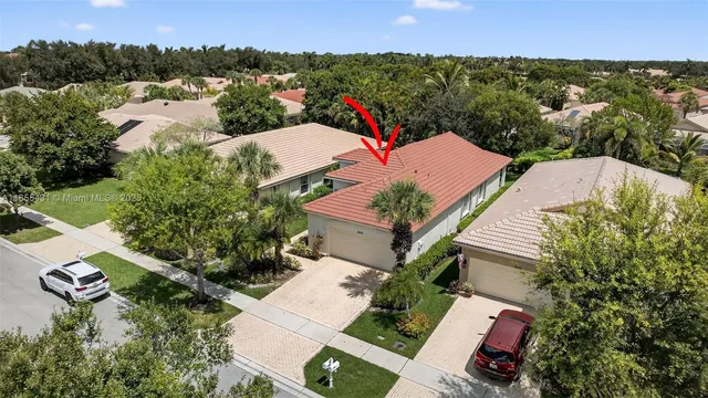 a view of swimming pool with a table and chairs