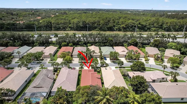 a view of a swimming pool with an outdoor seating